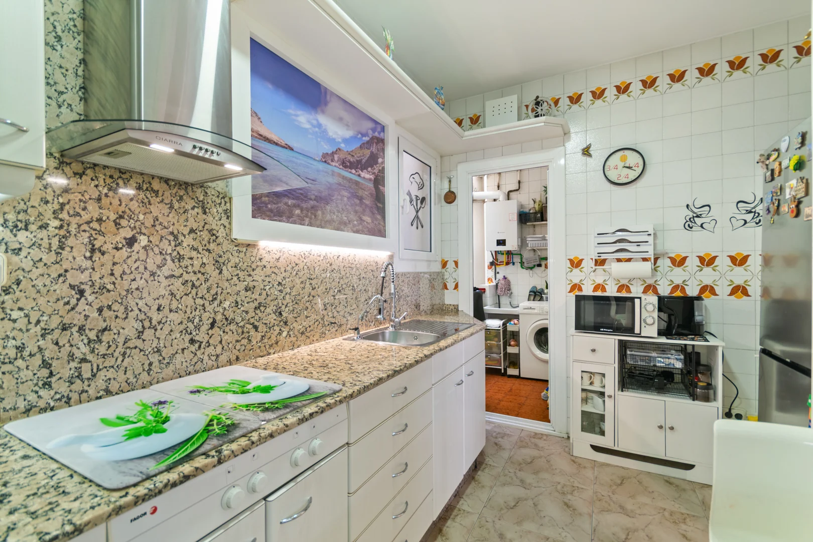 Separate kitchen with worktops and cooking area