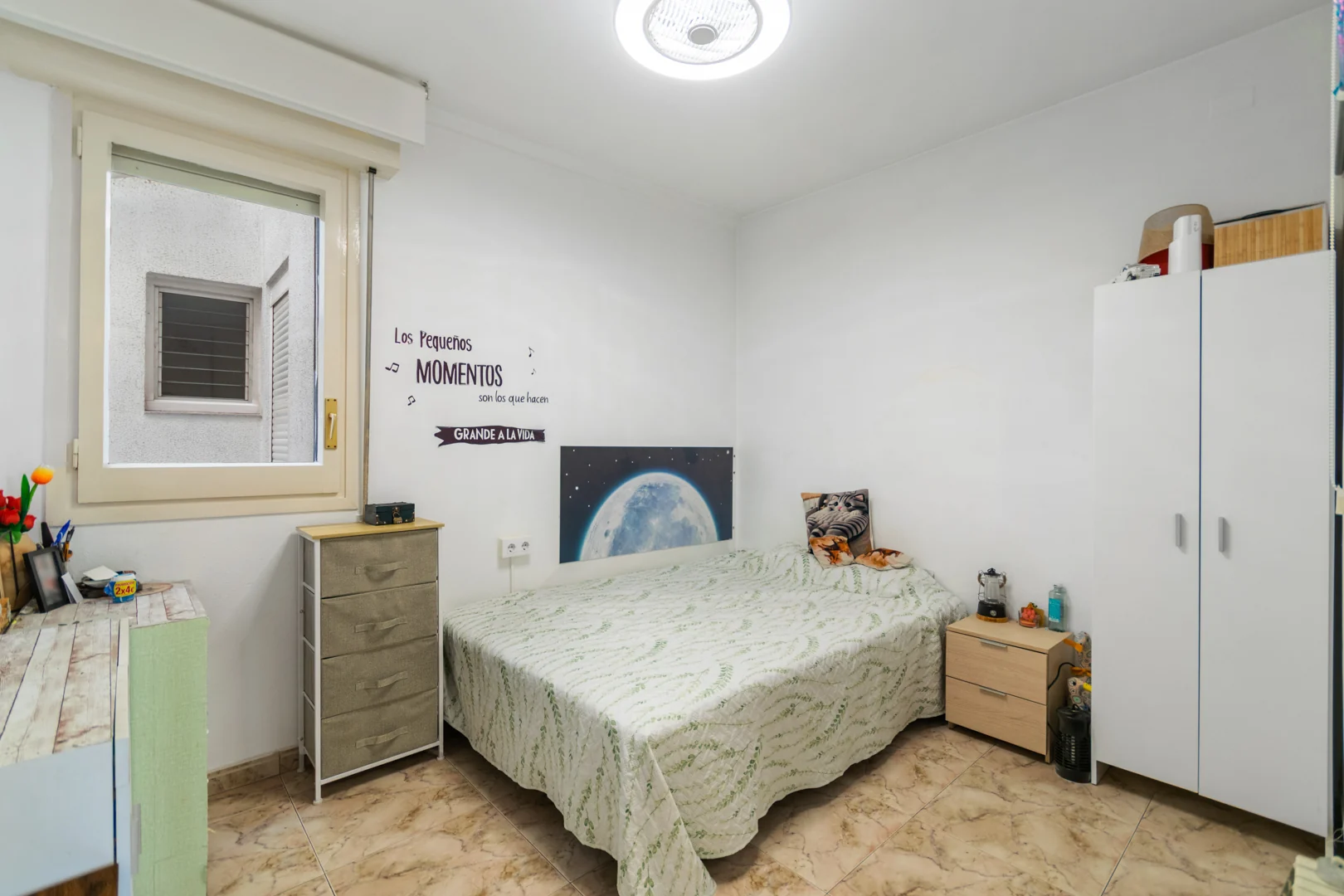Bedroom with a window facing the inner courtyard